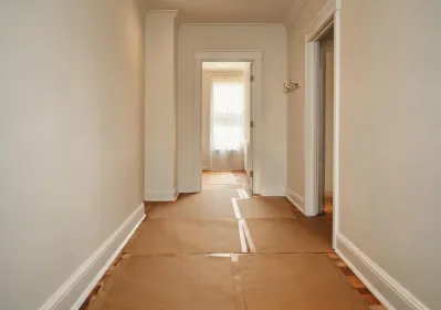Hardwood floors covered during home renovation